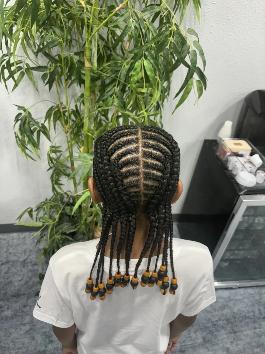 Child's cornrows with beaded ends, back view