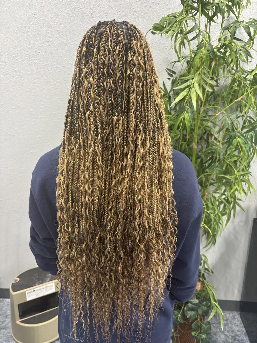 Long honey-blonde boho knotless braids with curly pieces