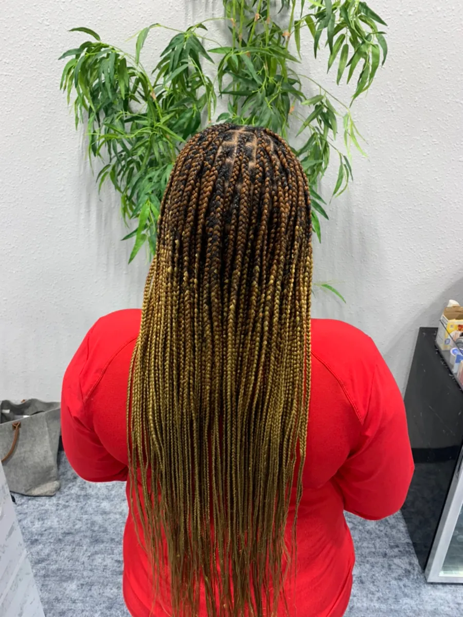 Long honey-brown knotless braids